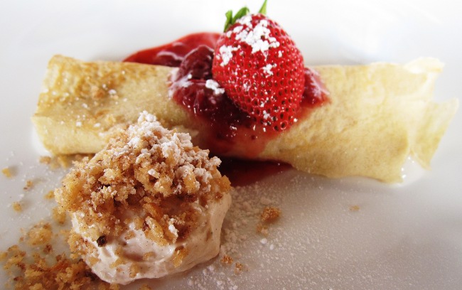 Crepe filled with tembleque and a strawberry comfit at Crispy y Relleno in Pinones, Puerto Rico Crepe filled with tembleque and a strawberry comfit at Crispy y Relleno in Pinones, Puerto Rico