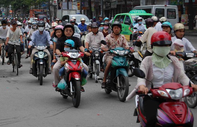 Crazy Vietnam Traffic from Saigon (Ho Chi Minh City) Crazy Vietnam Traffic from Saigon (Ho Chi Minh City)